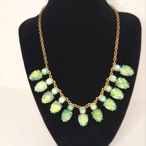 Gold and green leaf abalone style necklace